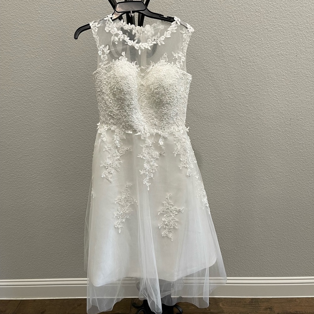 Sleeveless tea-length tags on wedding or bridal event dress Jaeden size 8 ivory
